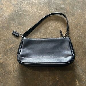 A mini Y2K leather Coach purse.